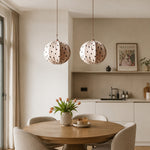Bild in Gallery-Viewer laden, Cream polka dot pendant lamps over a round dining table