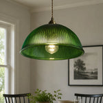 Bild in Gallery-Viewer laden, Emerald green ribbed glass pendant close view in a dining room