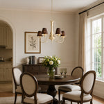 Bild in Gallery-Viewer laden, French chandelier centered above a round dining table in a neutral interior