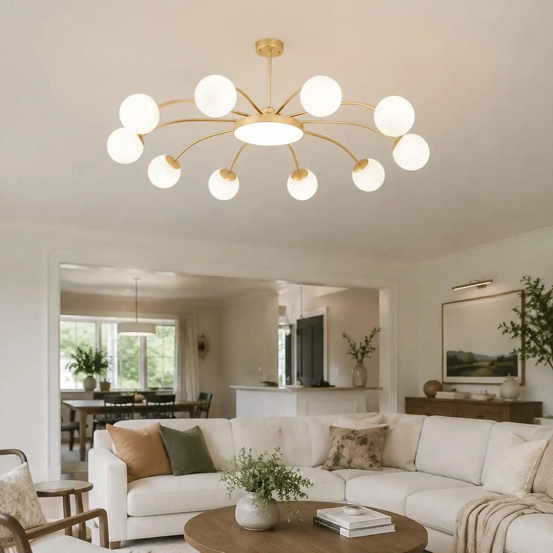 Gold ten-light chandelier in an open-plan room