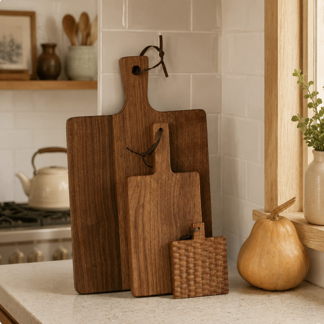 Wood cutting boards displayed in a kitchen