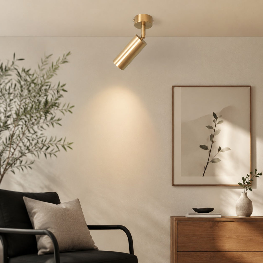 Brass ceiling spotlight in a living room installation scene