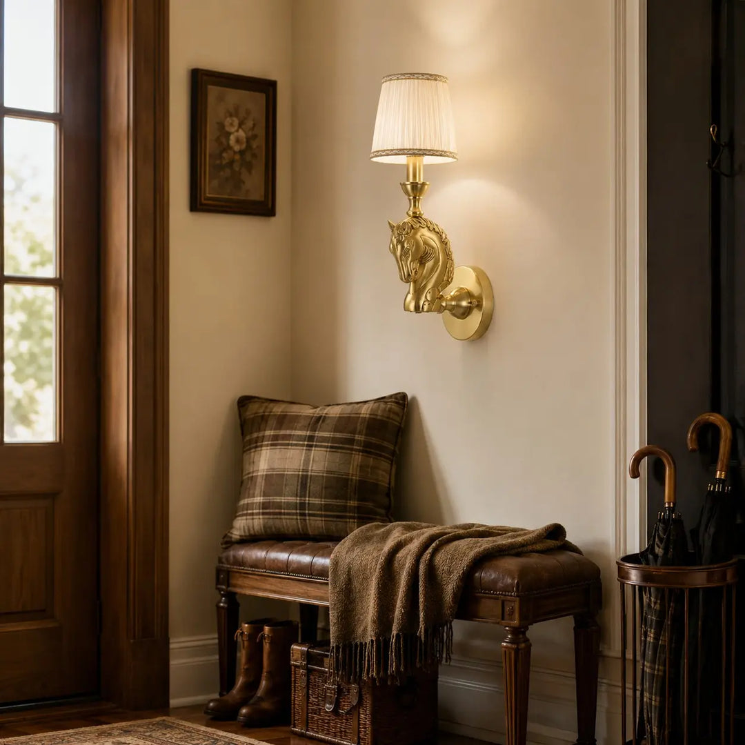 Pleated shade horse wall lamp beside a reading chair