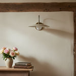 Load image into Gallery viewer, Curva Metal Modern Wall Sconce - Antique Brass Arm with Cream Disc Shade
