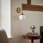 Load image into Gallery viewer, Glorica Glass Wall Sconce - Frosted Globe Light with Brass Fixture
