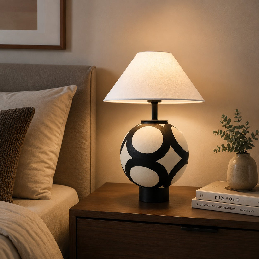 ceramic globe table lamp on bedside nightstand