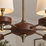 Charger l'image dans la visionneuse de galerie, Close-up of the walnut-toned central hub and antique-bronze arms
