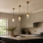 Bild in Gallery-Viewer laden, Natural copper mini pendant lights over a kitchen island