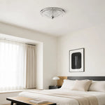 Load image into Gallery viewer, Chrome rippled glass ceiling light installed in a calm bedroom