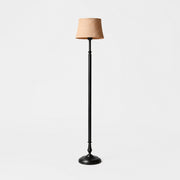 Vintage black iron floor lamp with natural linen shade