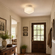 Embossed glass ceiling light in an entryway scene