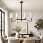 Bild in Gallery-Viewer laden, Strellux black linear chandelier in a dining room scene