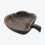 Apple-shaped wooden serving board on white background