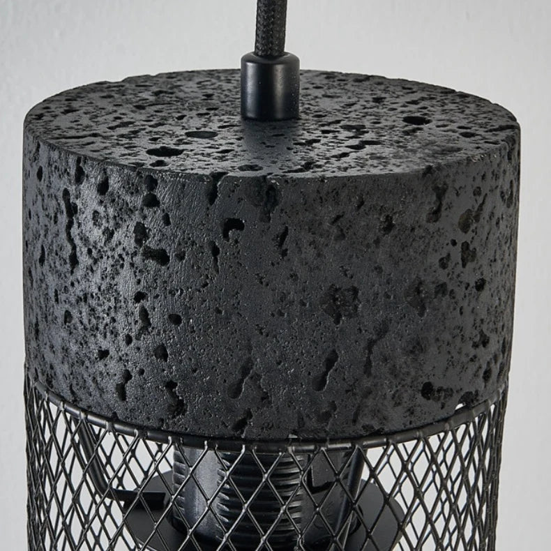 Close view of the black stone texture top and metal suspension connector