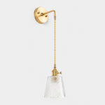 Bild in Gallery-Viewer laden, Clear faceted glass wall light with brass arm, AW shade 12 cm high and 13 cm diameter