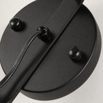 Bild in Gallery-Viewer laden, Close view of matte black round wall plate and cord detail