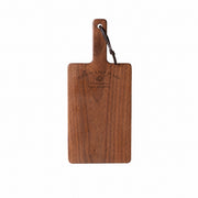Medium black walnut cutting board on a white background