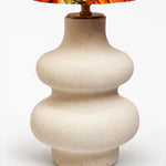 Load image into Gallery viewer, Close view of rounded handmade ceramic lamp base