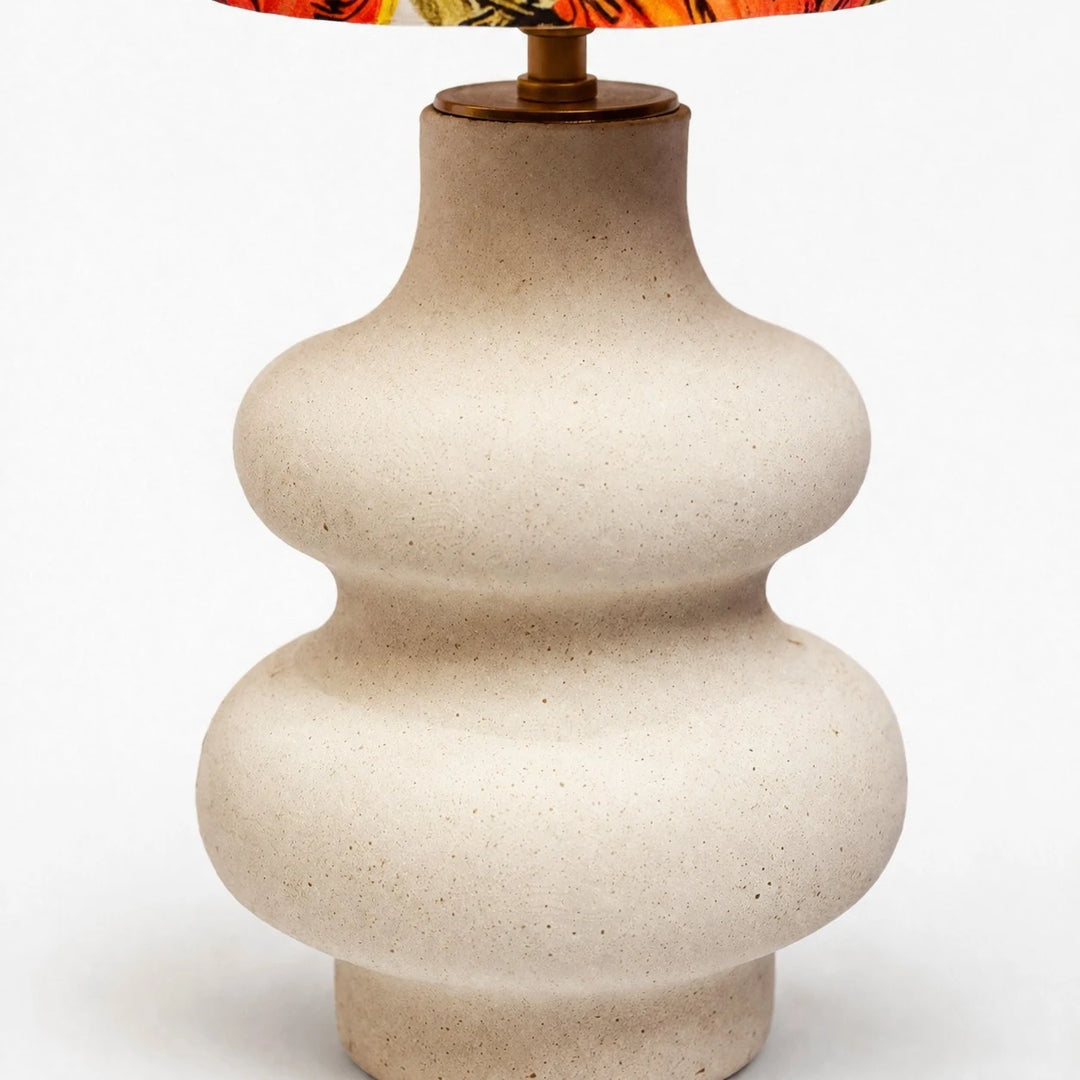 Close view of rounded handmade ceramic lamp base