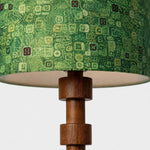 Load image into Gallery viewer, Patterned fabric shade and turned wood column detail