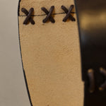 Bild in Gallery-Viewer laden, Leather pendant edge lacing close-up