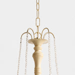 Bild in Gallery-Viewer laden, Close-up of gold-tone hanging chain and crystal bead suspension details