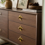 Cargar imagen en el visor de la Galería, Antique brass swallow handles on a wood dresser
