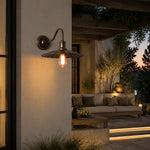 Load image into Gallery viewer, Outdoor wall sconce at a covered exterior entry