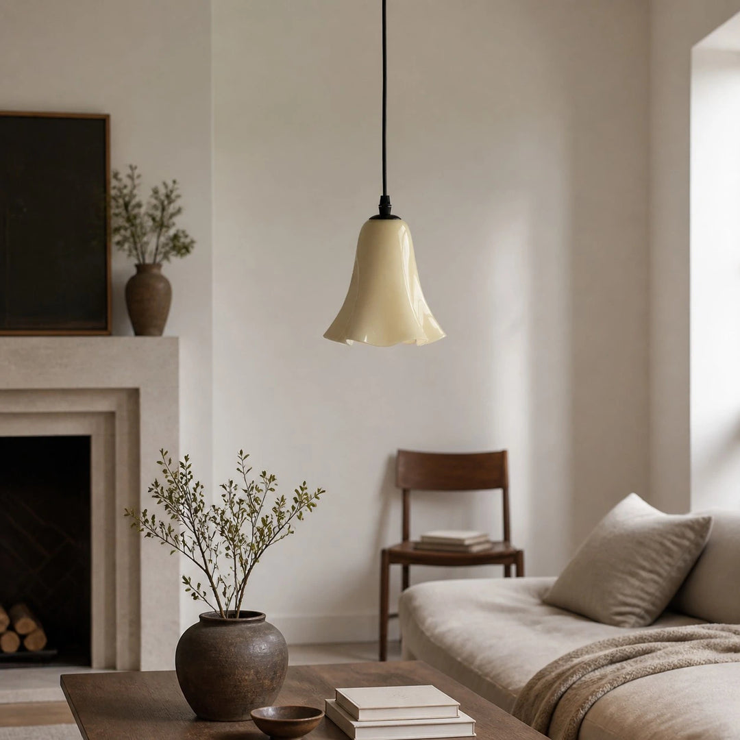 Cream yellow glass pendant light in a living room