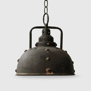 Distressed black dome pendant lamp in dining room scene