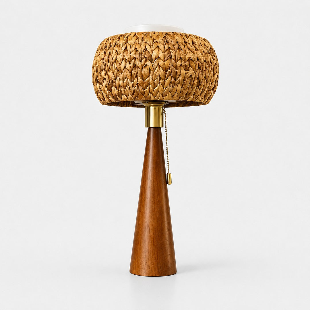 Full view of the woven natural fiber and wood pull-chain table lamp