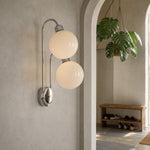 Charger l'image dans la visionneuse de galerie, Milk coffee glass globe wall lamp above a vanity table