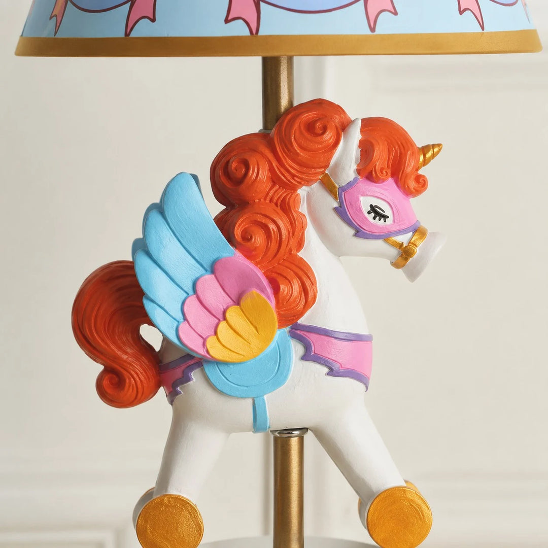 Close view of colorful unicorn carousel ornament detail