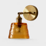 Load image into Gallery viewer, Amber hammered glass brass wall sconce