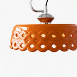 Load image into Gallery viewer, Glossy orange metal and ceramic shade with pierced wave pattern