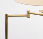 Cargar imagen en el visor de la Galería, Lámpara de pie articulada Rowan: diseño de hierro ajustable para iluminación de tareas
