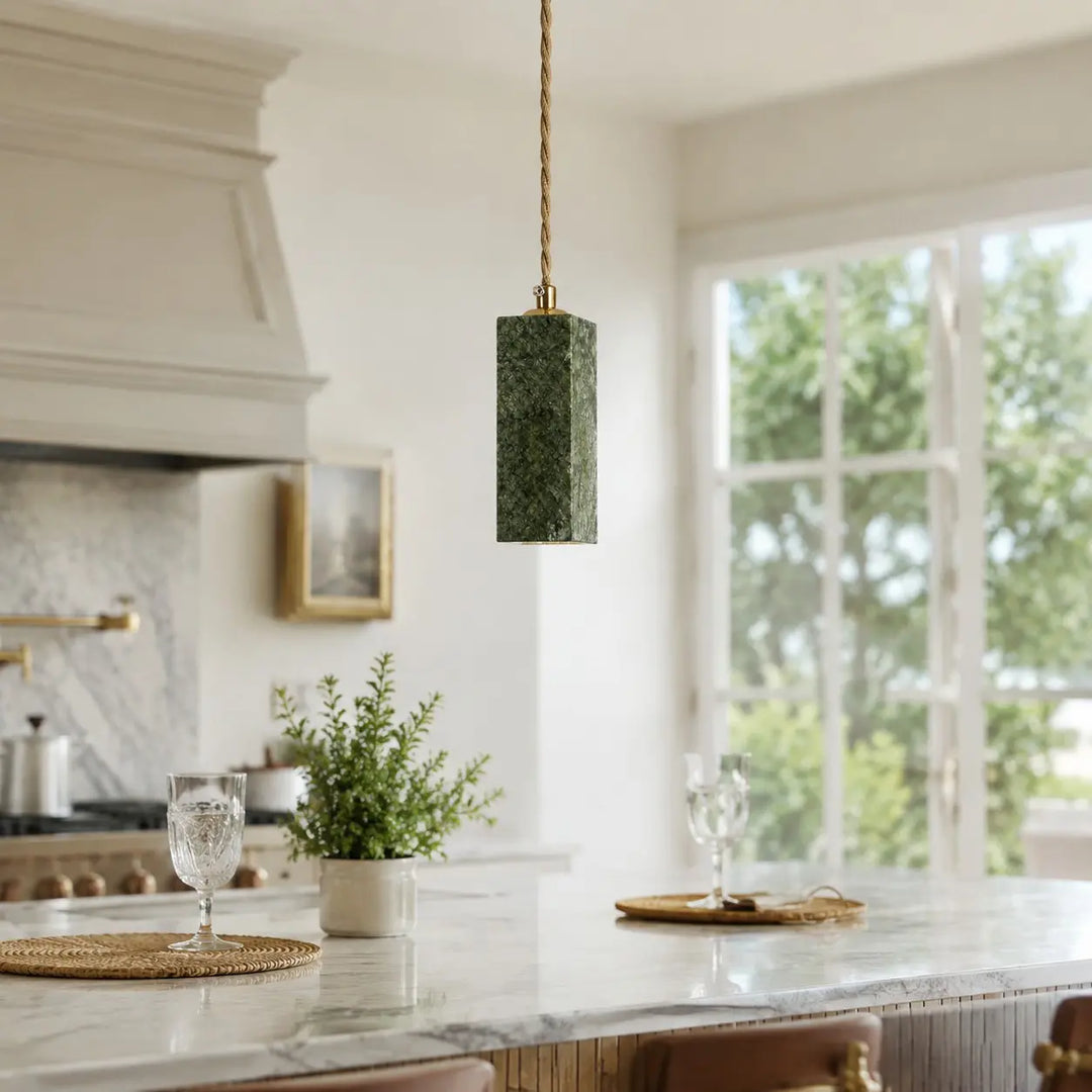 Green jade pendant light in a bright kitchen