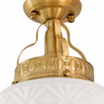 Load image into Gallery viewer, Brass-finish canopy and curved support detail