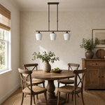 Load image into Gallery viewer, Strellux three-head Coffee Brown chandelier in a breakfast nook