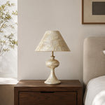 Cargar imagen en el visor de la Galería, Capiz shell table lamp on a wooden bedside table in a warm bedroom