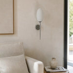 Cargar imagen en el visor de la Galería, Milk glass wall sconce in a quiet lounge space