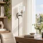 Bild in Gallery-Viewer laden, Chrome ribbed-glass sconce beside a desk in daylight