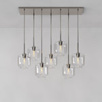 Load image into Gallery viewer, Lumivelle Sculptural 7-Light Chandelier – Adjustable Height Modern Glass Pendant
