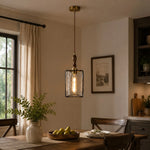 Bild in Gallery-Viewer laden, Clear glass pendant installed above a dining table