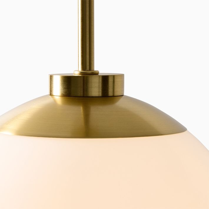 Lámpara colgante Rivolence Globe: elegante iluminación de latón