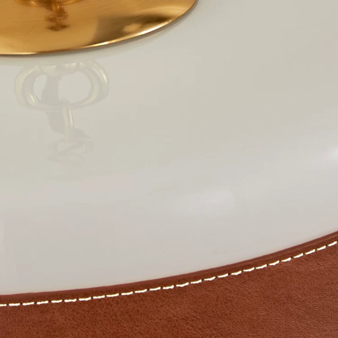 Milky glass texture and brass underside detail