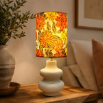 Load image into Gallery viewer, Liberty floral ceramic table lamp on a side table