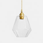 Cargar imagen en el visor de la Galería, Clear faceted glass pendant light with antique brass holder on white background