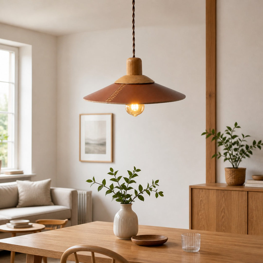 Brown leather pendant above a bright dining table
