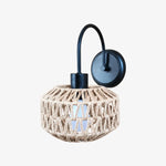 Bild in Gallery-Viewer laden, Shade B woven rattan wall sconce in matte black